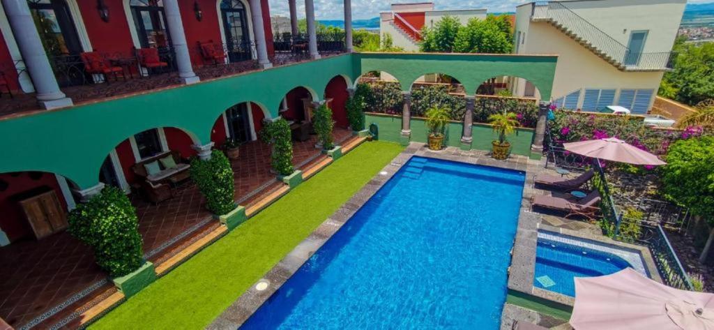 Bazén v ubytování Casa Don Pascual Hotel Boutique Sweet Home nebo v jeho okolí