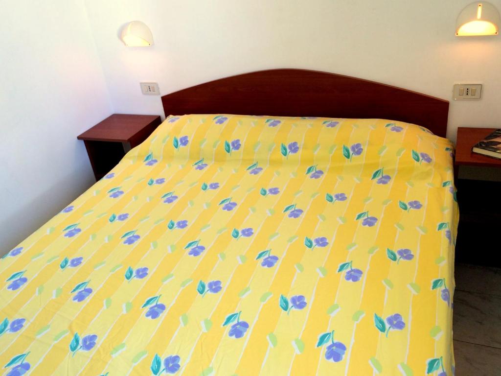 Кровать или кровати в номере Residence Palm Garden