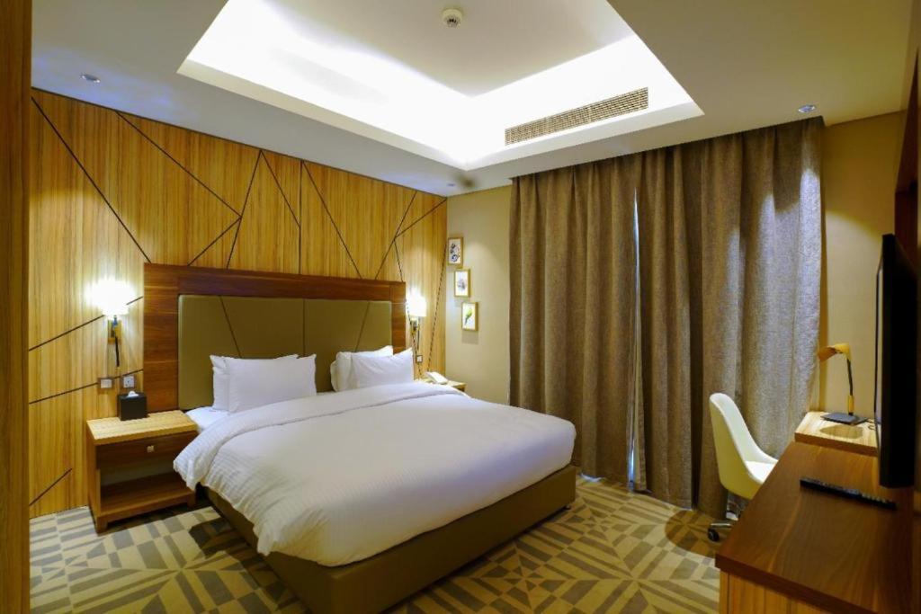 Letto o letti in una camera di Al Aseel Hotel