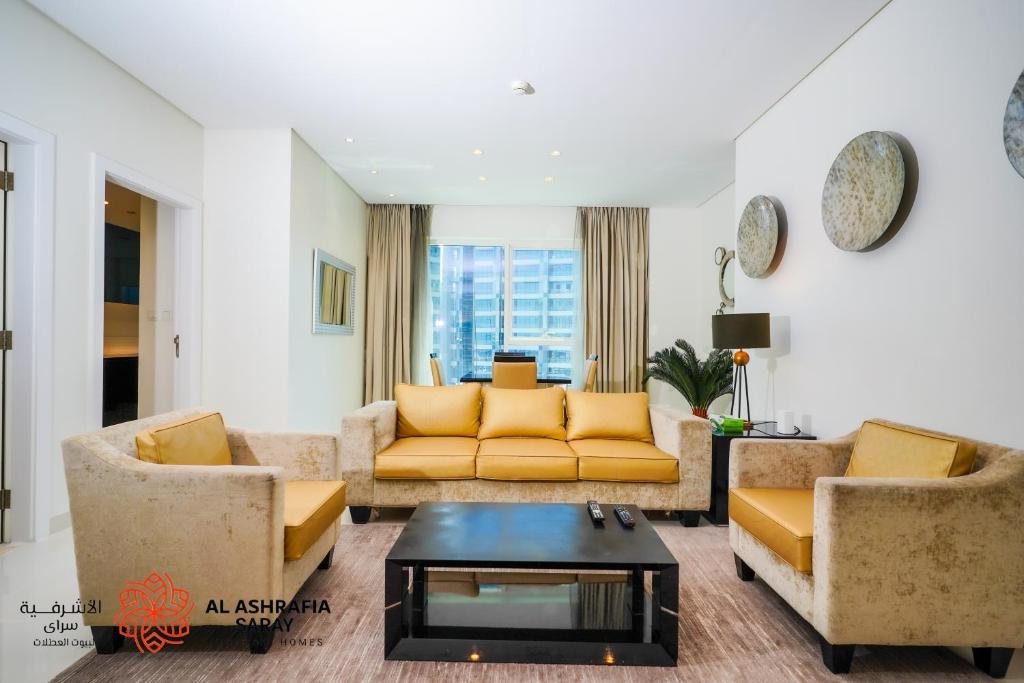 Posezení v ubytování Alashrafia Saray - Fabulous 1BR in Canal Views