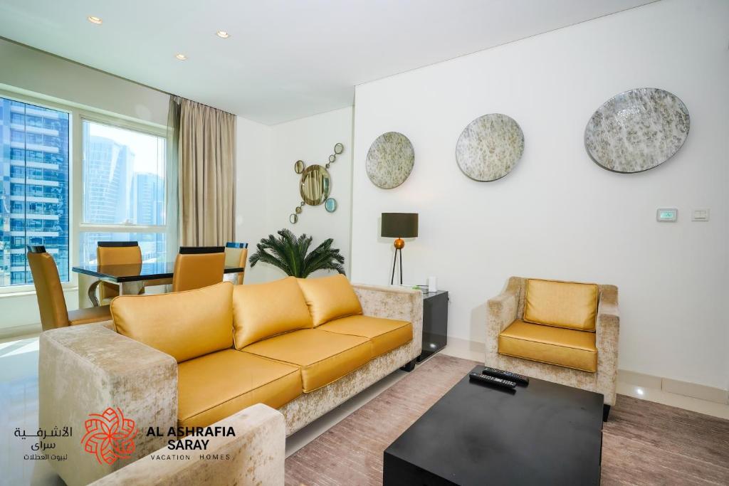 Posezení v ubytování Alashrafia Saray - Fabulous 1BR in Canal Views