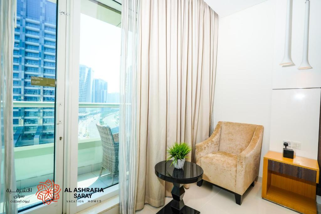 Posezení v ubytování Alashrafia Saray - Fabulous 1BR in Canal Views
