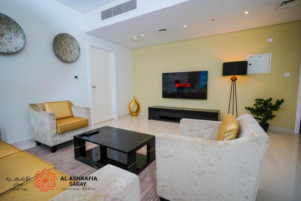 Posezení v ubytování Alashrafia Saray - Fabulous 1BR in Canal Views
