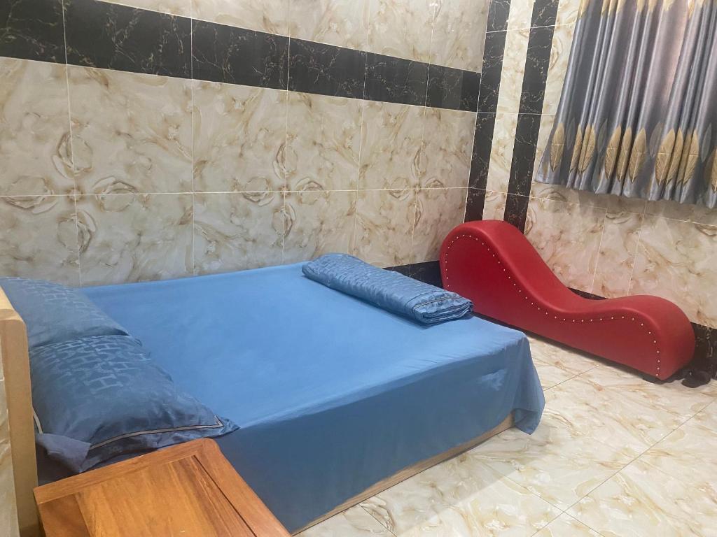 Voodi või voodid majutusasutuse Khách Sạn Hội Nghĩa Bình Dương toas