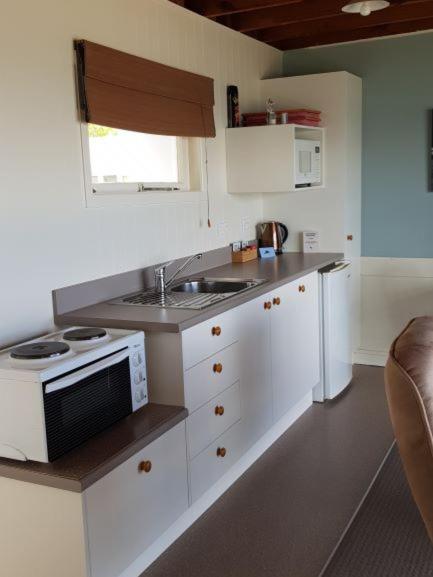 Kuchyň nebo kuchyňský kout v ubytování Waitahanui Lodge
