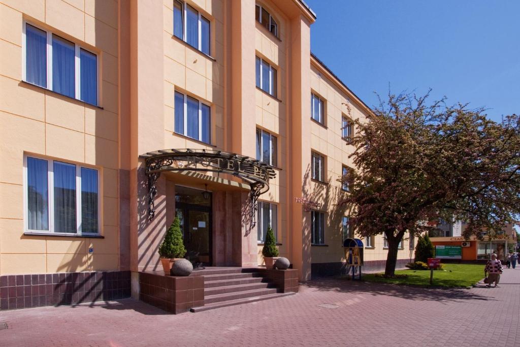 a building with an entrance to a building at Hotel Plock in Płock