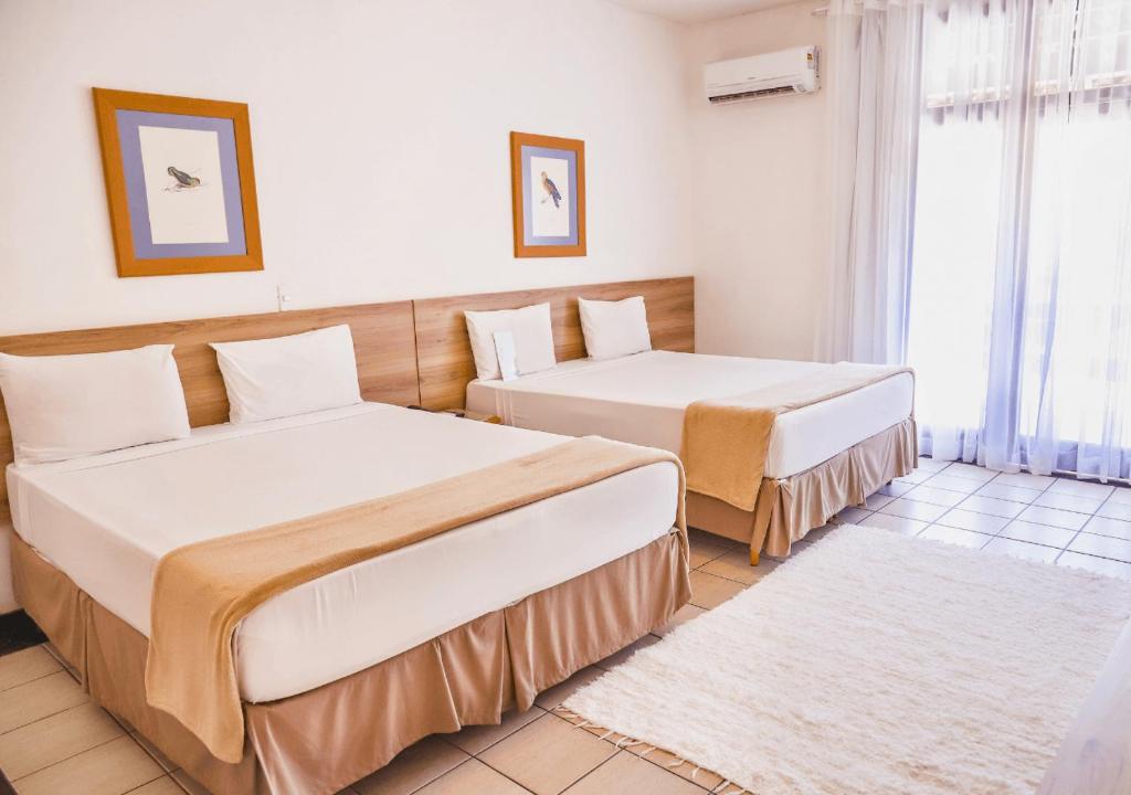 Postel nebo postele na pokoji v ubytování PSP Resort All Inclusive