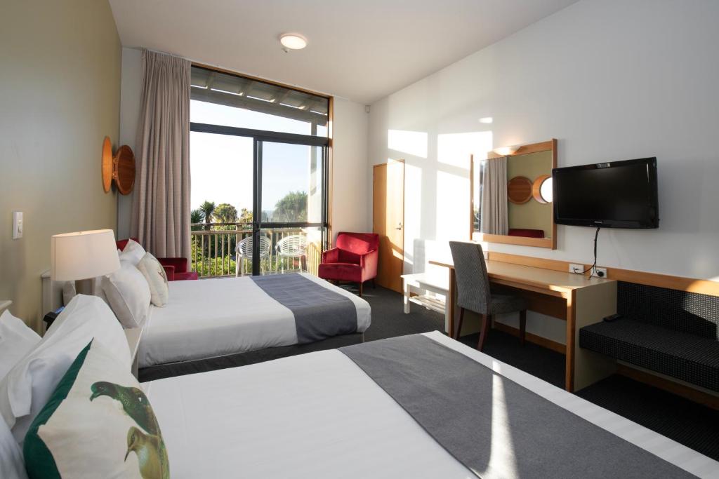 Postel nebo postele na pokoji v ubytování Scenic Hotel Punakaiki