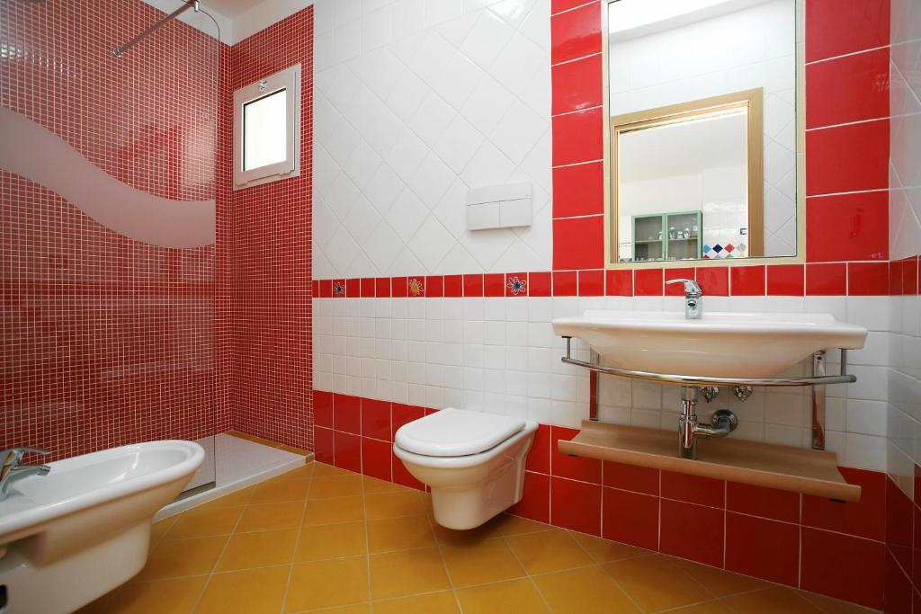 Koupelna v ubytování Residence La Pigna