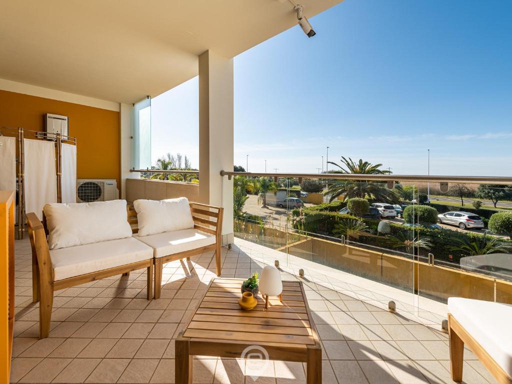 En balkon eller terrasse på Poetto Panoramic Apartment