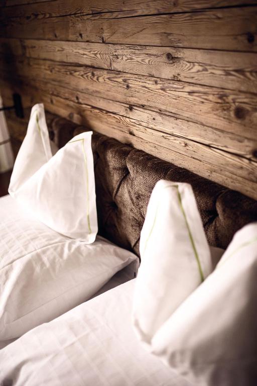 Postel nebo postele na pokoji v ubytování Hotel Gotthard