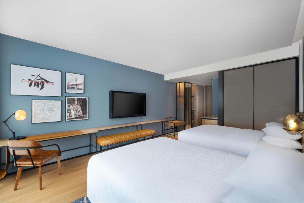 Postel nebo postele na pokoji v ubytování Four Points by Sheraton Chongqing, Yongchuan
