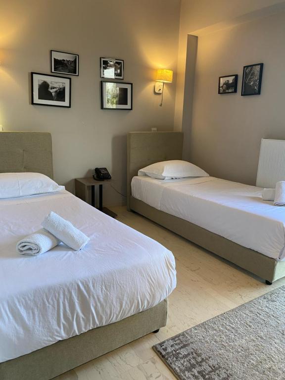 Athens Iris Hotel客房内的一张或多张床位