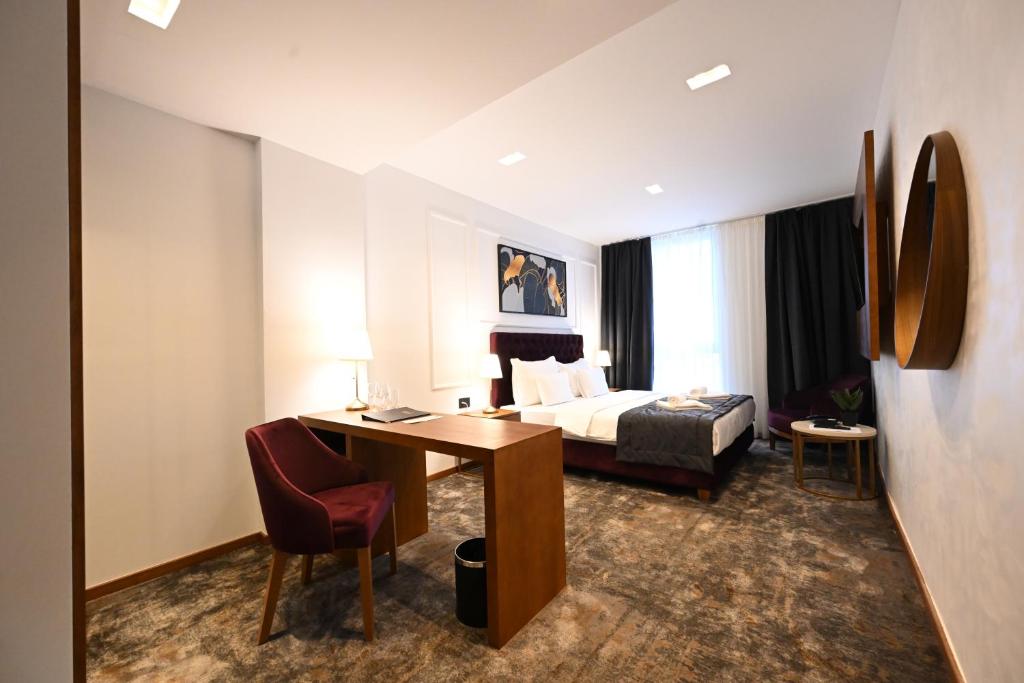 TV a/nebo společenská místnost v ubytování Hotel Tamiš & Spa
