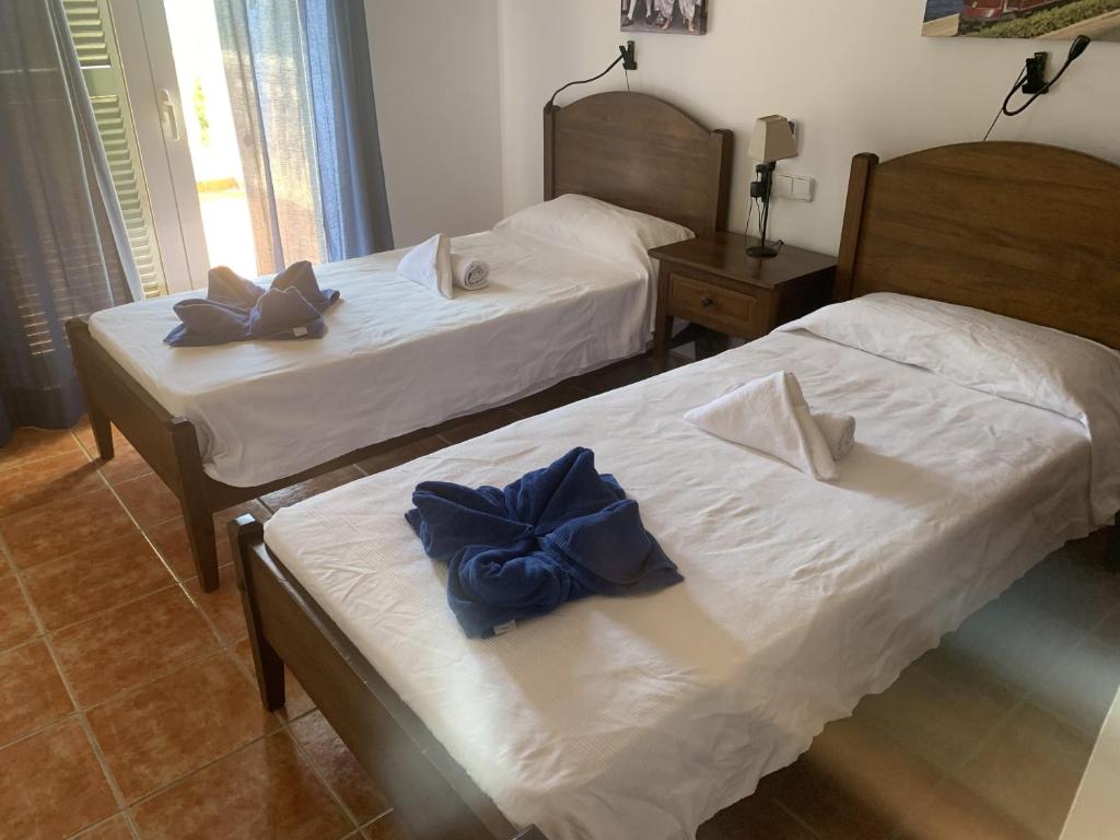 Postel nebo postele na pokoji v ubytování Villa Paula