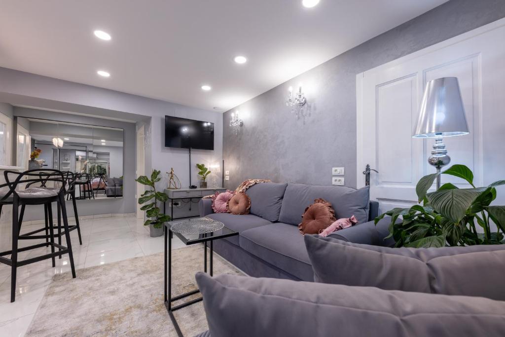 TV a/nebo společenská místnost v ubytování MM Rooms