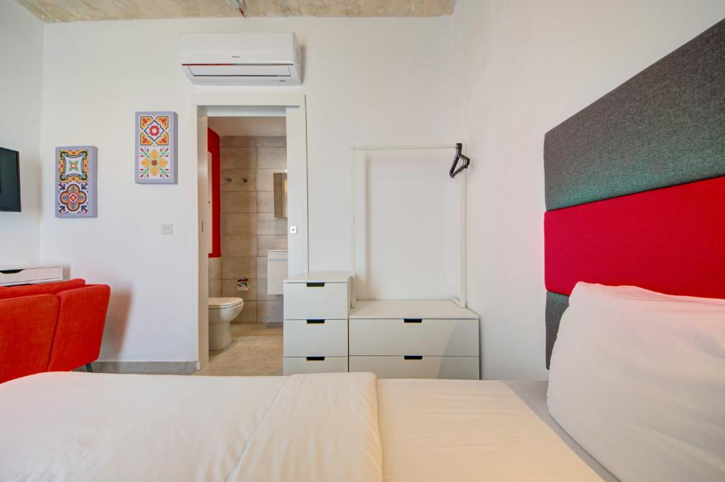 Postel nebo postele na pokoji v ubytování Casa Domenico 2