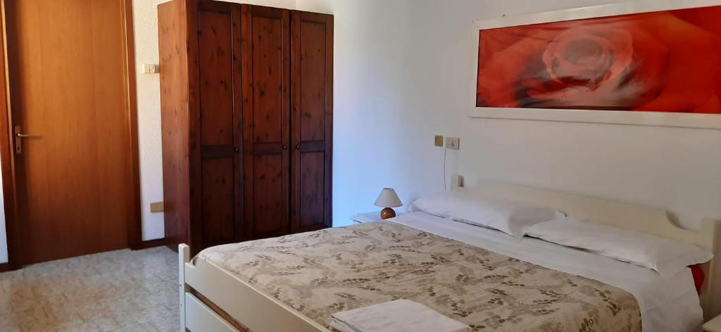 Postel nebo postele na pokoji v ubytování Ostello Al Deserto