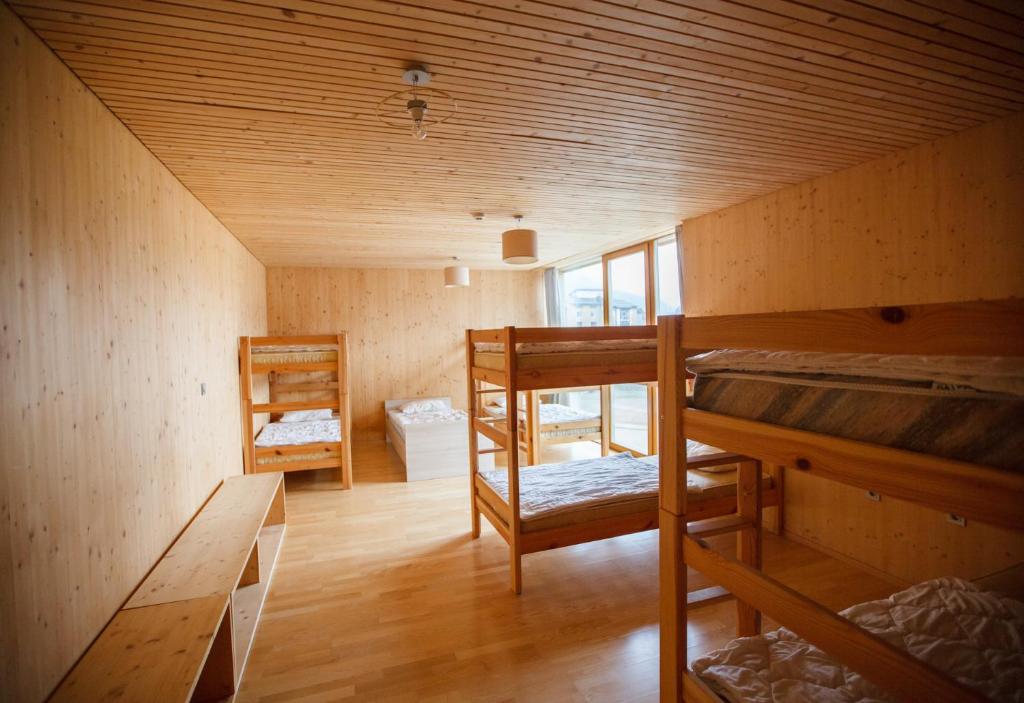 Postel nebo postele na pokoji v ubytování Youth Hostel Punkl