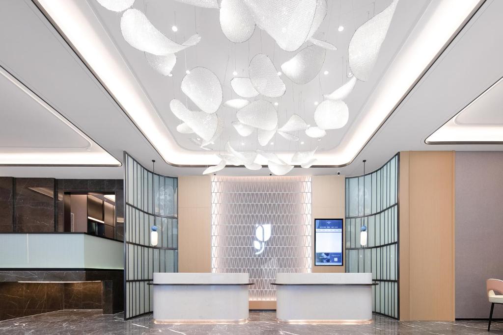 Vstupní hala nebo recepce v ubytování Country Inn & Suites by Radisson - Taishan East Branch