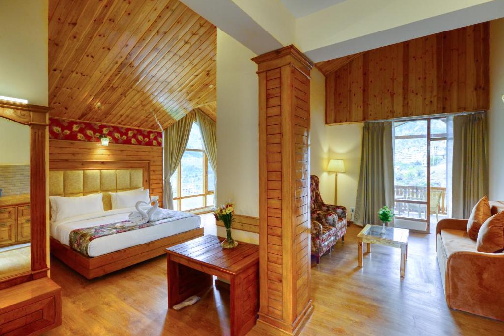 Postel nebo postele na pokoji v ubytování Clarks Inn Suites, Manali