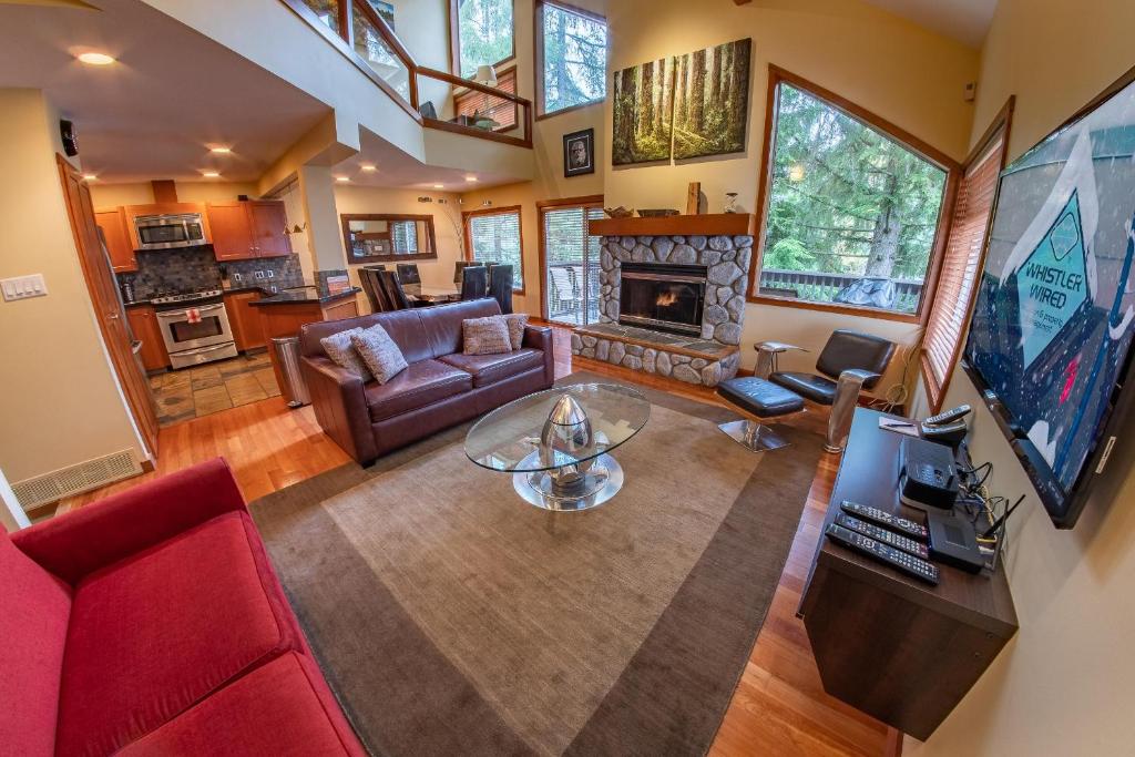 an aerial view of a living room with a fireplace at Snowy Creek 04 - Ski In Ski Out, Private Hot Tub, Short Walk to Whistler Village in Whistler