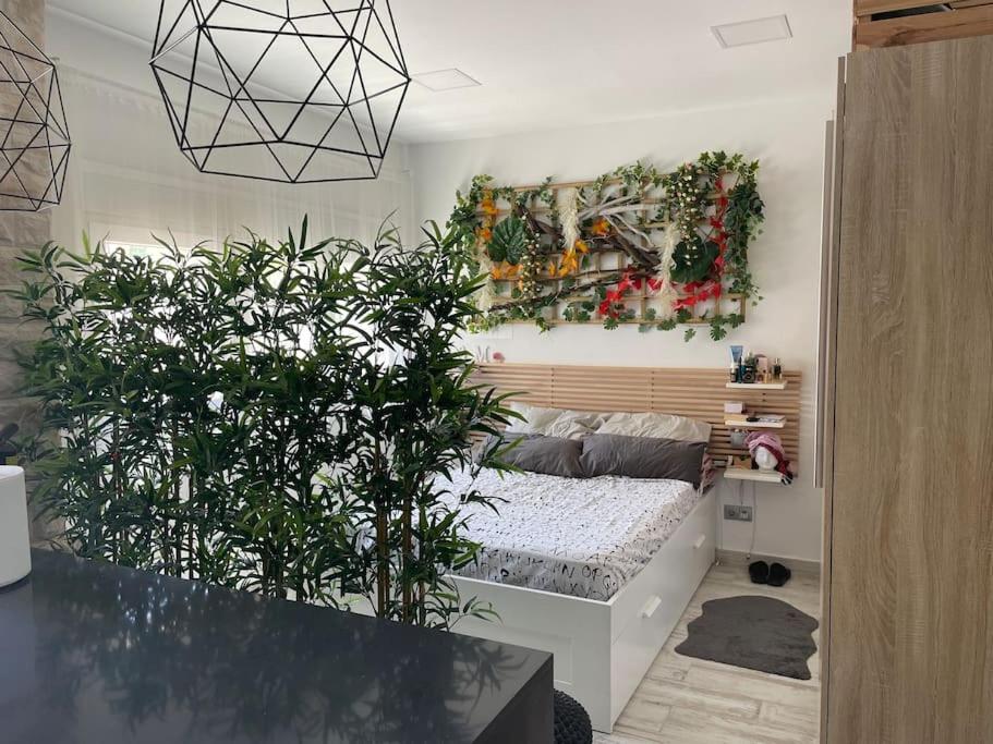 Postel nebo postele na pokoji v ubytování CASA MAUI