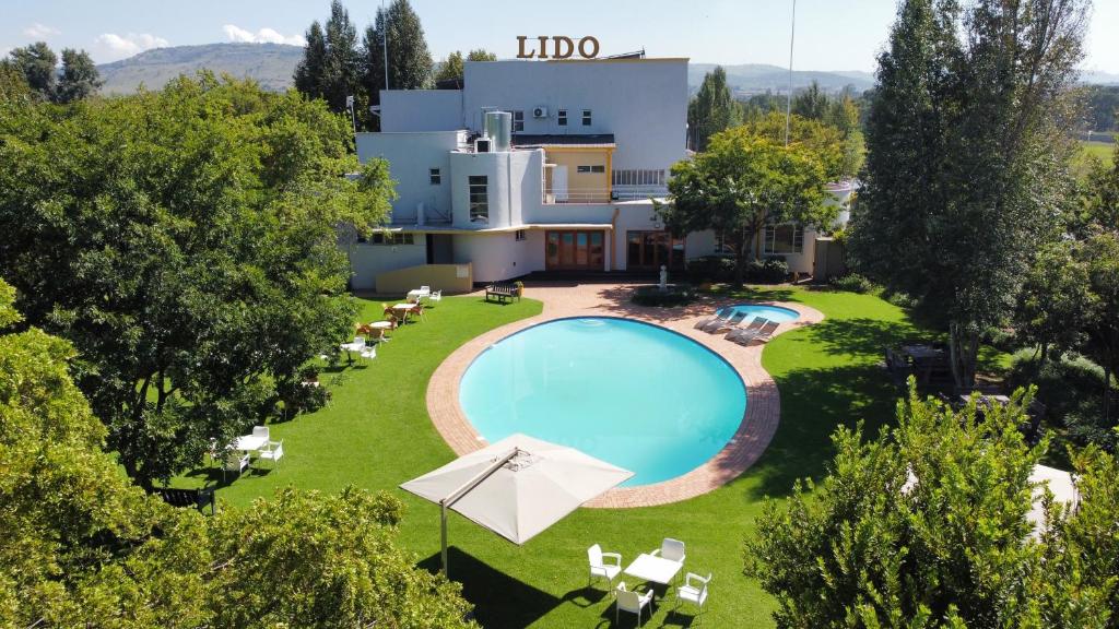 an aerial view of a villa with a swimming pool at Lido Hotel in Johannesburg
