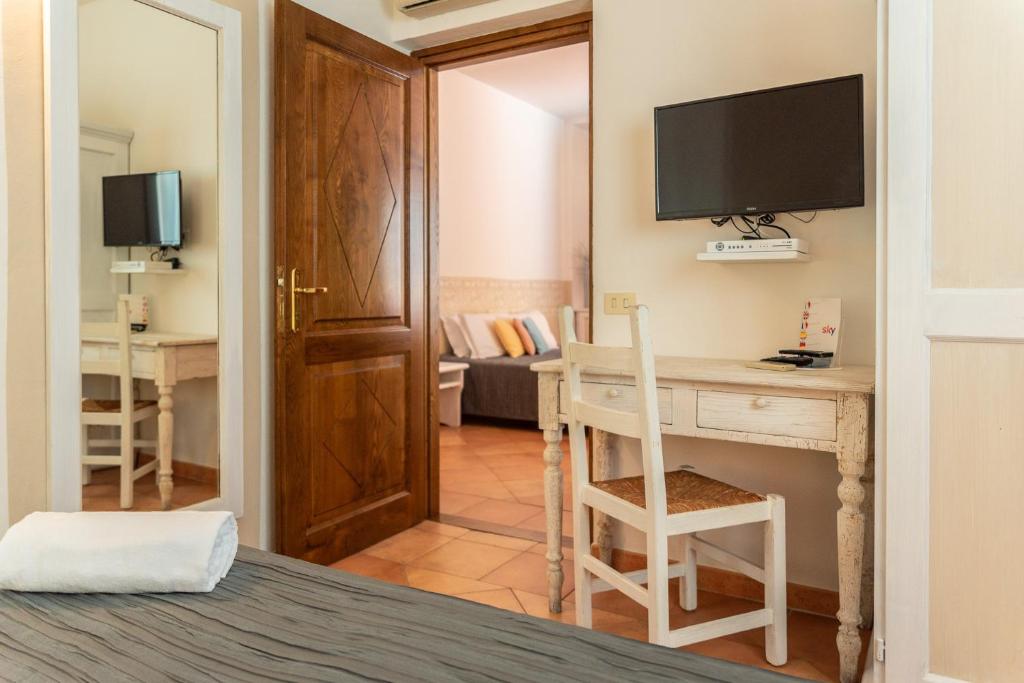 TV a/nebo společenská místnost v ubytování Boutique Hotel Sant'Andrea & Relais