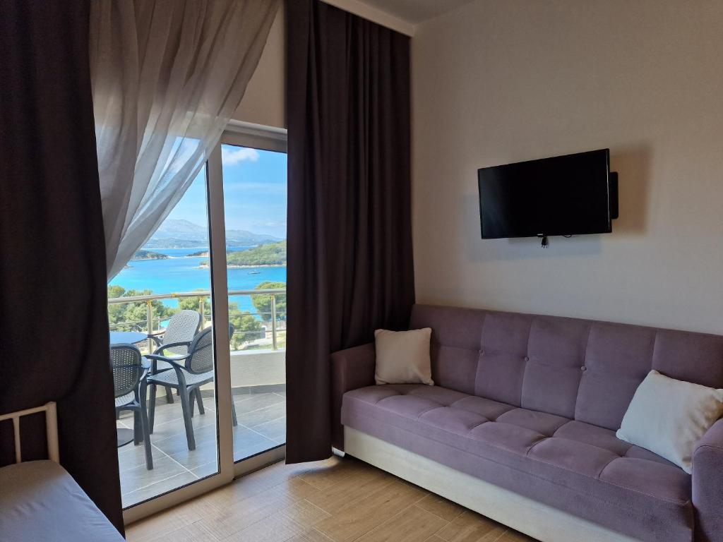 TV a/nebo společenská místnost v ubytování Hotel Queen Margaret Seaside