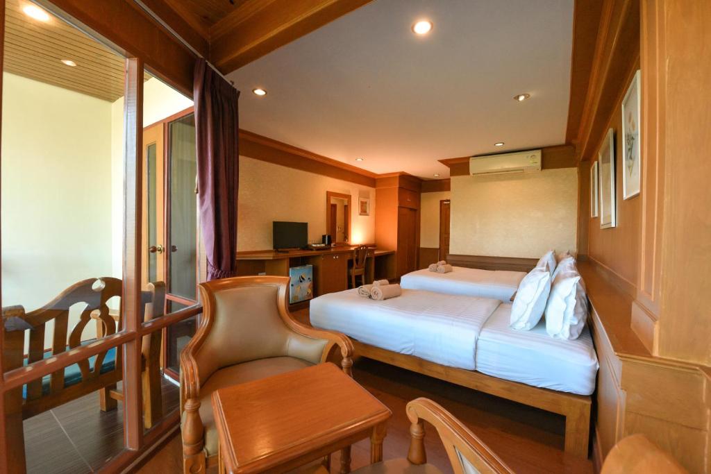Postel nebo postele na pokoji v ubytování Ko Tao Resort Paradise Zone