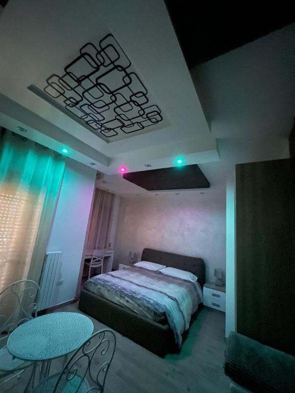 Posteľ alebo postele v izbe v ubytovaní B&B IL CAVALIERE