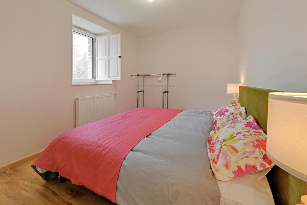 Łóżko lub łóżka w pokoju w obiekcie Petit Marigny - Belle maison pour 10 voyageurs