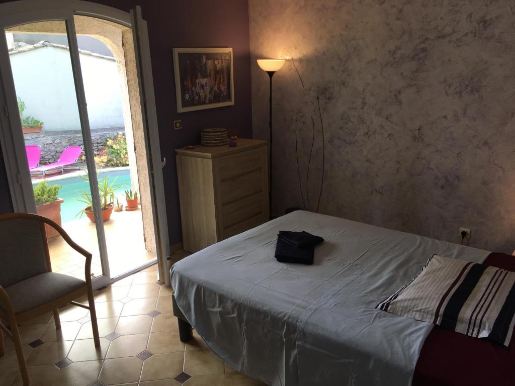 Łóżko lub łóżka w pokoju w obiekcie Charmante villa en Petite Camargue