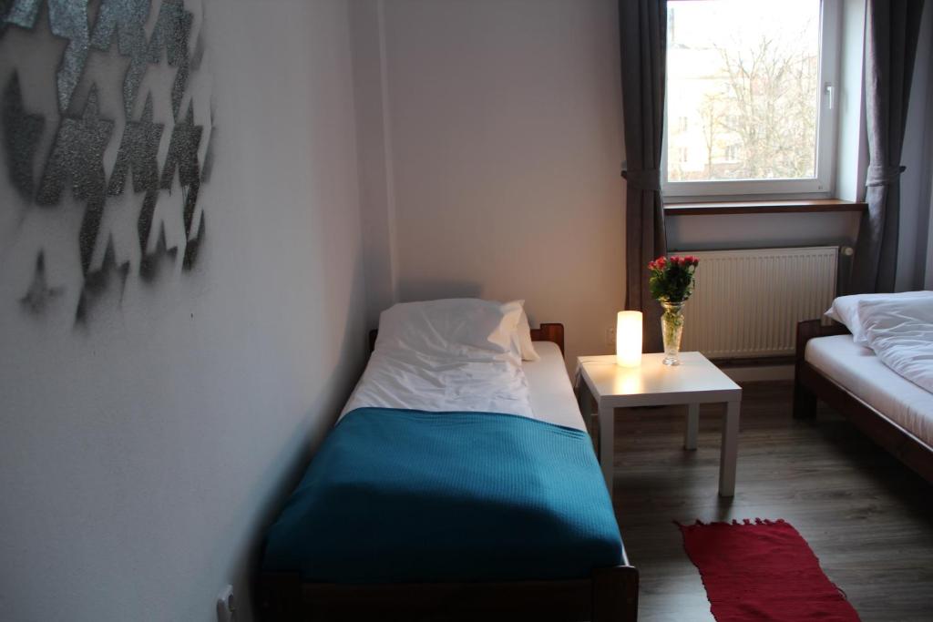Posteľ alebo postele v izbe v ubytovaní Baba Hostel