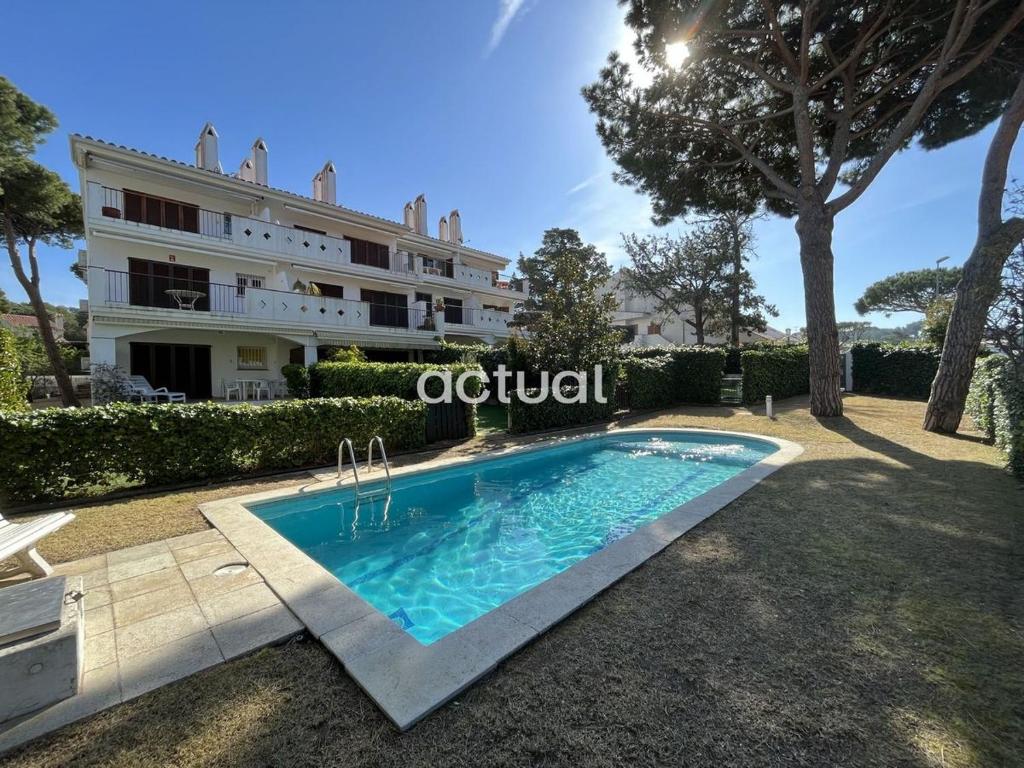 Bazén v ubytovaní Residencial S´Agaro Bajos Dcha alebo v jeho blízkosti