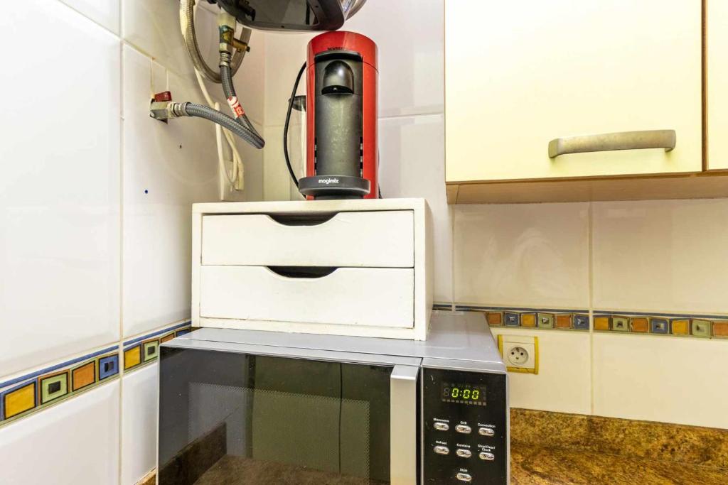Kuchyňa alebo kuchynka v ubytovaní Les Algues Encantador apartamento en el centro