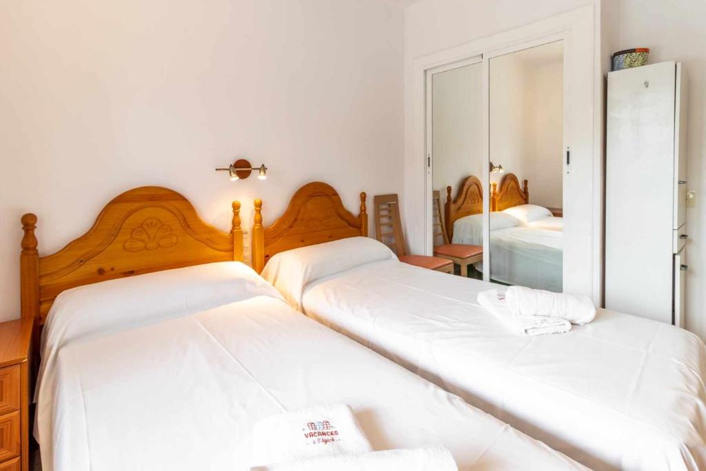 Posteľ alebo postele v izbe v ubytovaní Les Algues Encantador apartamento en el centro
