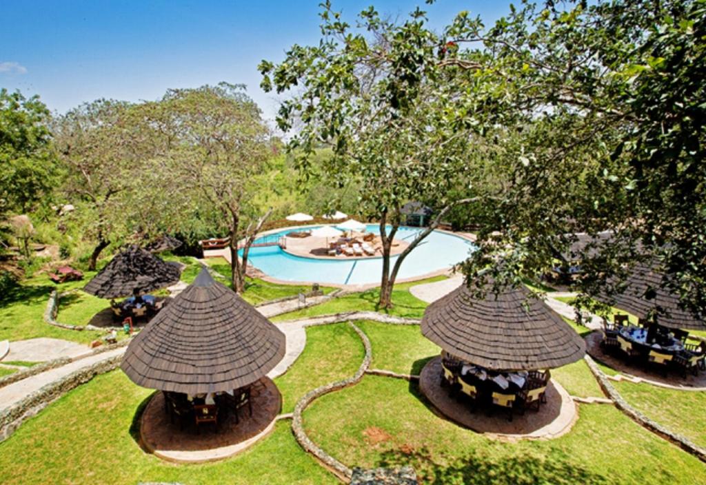 an aerial view of a resort with a swimming pool at Tarangire Sopa Lodge in Madege