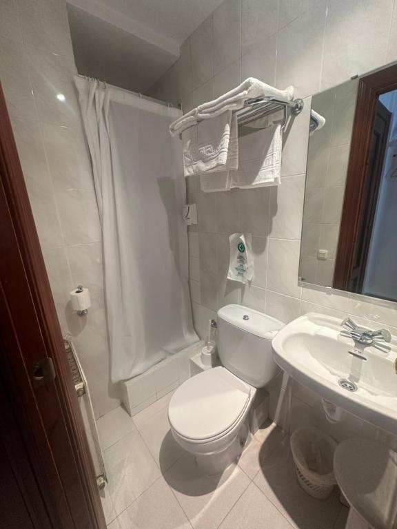 Koupelna v ubytování Hotel Torino