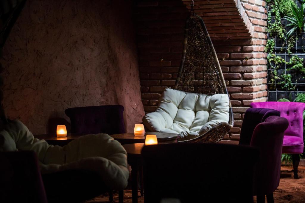 Posezení v ubytování HÔTEL C SUITES chambres spacieuses