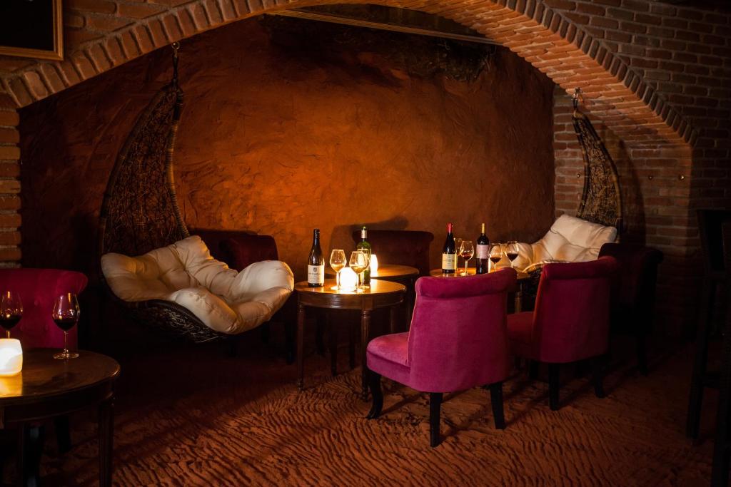 Posezení v ubytování HÔTEL C SUITES chambres spacieuses