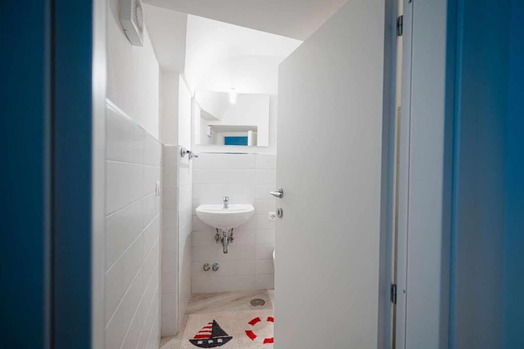 A bathroom at White Amalfi Centro Storico by ItalianHost