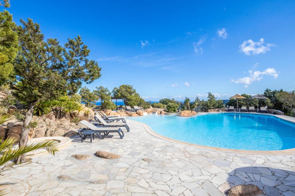 an image of a swimming pool at a resort at Résidence Santa Monica in Bonifacio