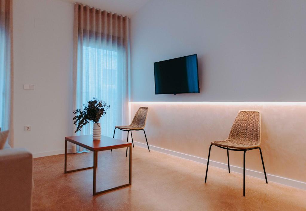 TV a/nebo společenská místnost v ubytování Apartamentos Santa Isabel