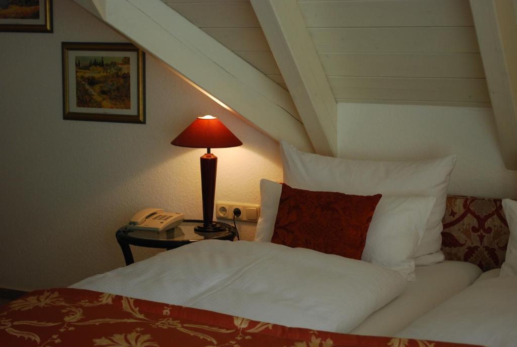 Postel nebo postele na pokoji v ubytování Im Winkel Appartements und Zimmer
