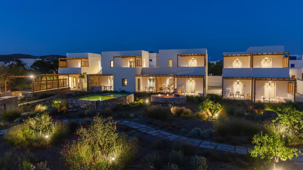 an aerial view of a house at night at Kalami Suites in Livadi