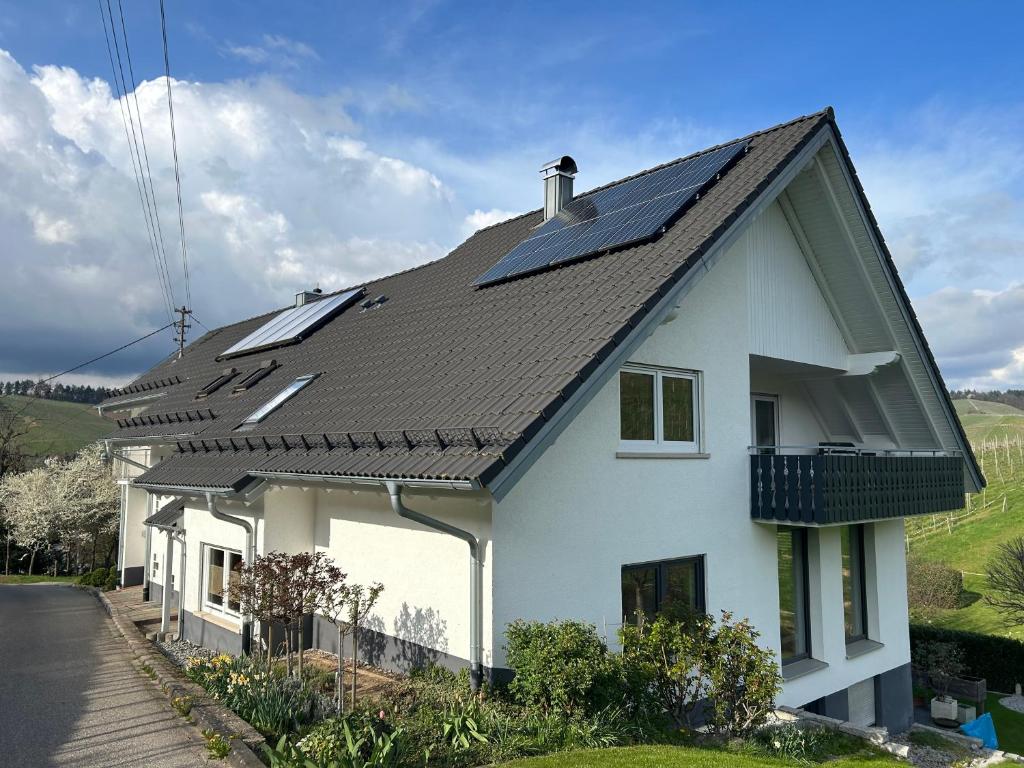 a house with solar panels on the roof at Revier No11 in Durbach