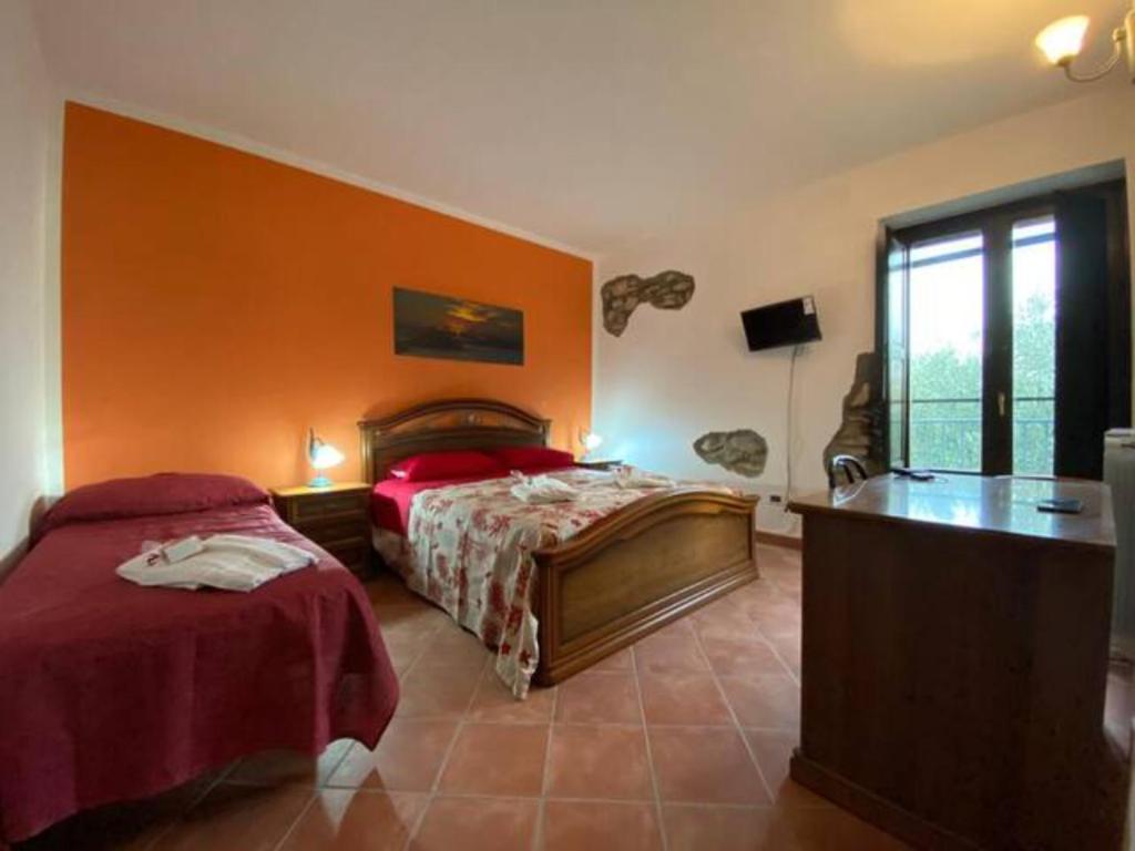 Postel nebo postele na pokoji v ubytování AsceaExperience Rooms