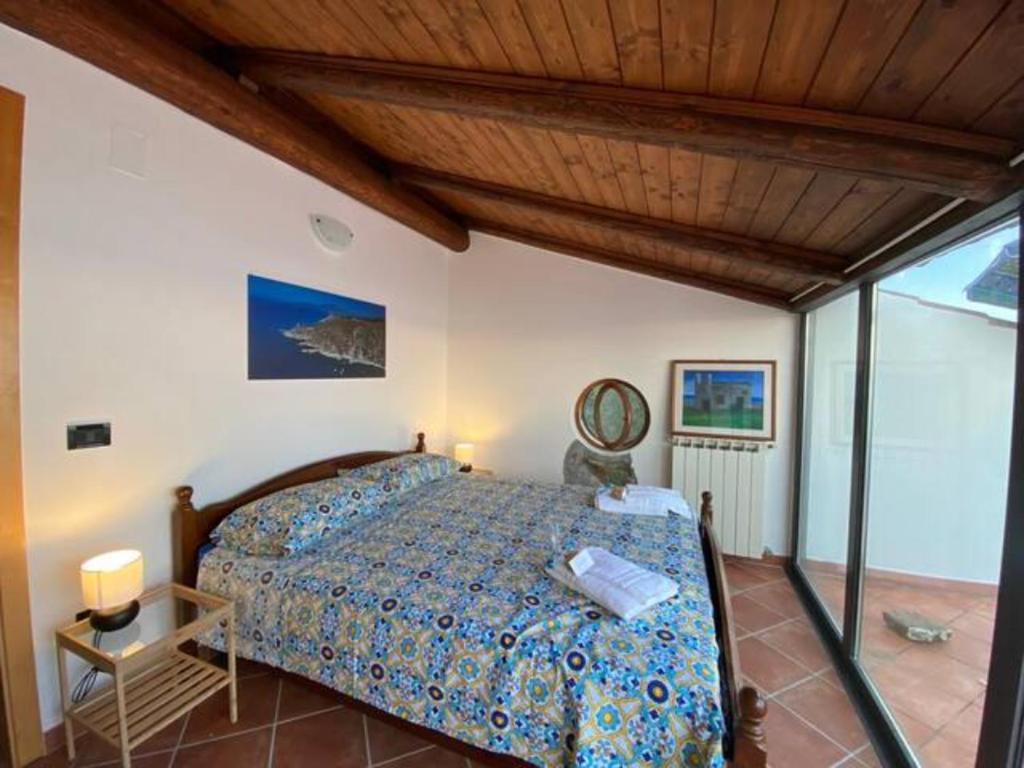 Postel nebo postele na pokoji v ubytování AsceaExperience Rooms
